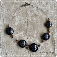 Lentil Zwart-Brons confetti zwevend (lampwork)