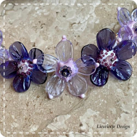 Lila paarse bloemketting van glas (lampwork)