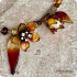 Bruine bloemketting met lange bladeren (lampwork)