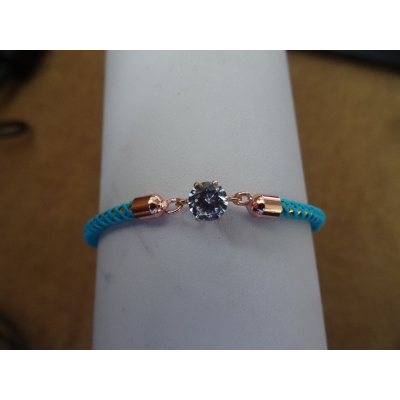 Armband dames turquoise band met steen.