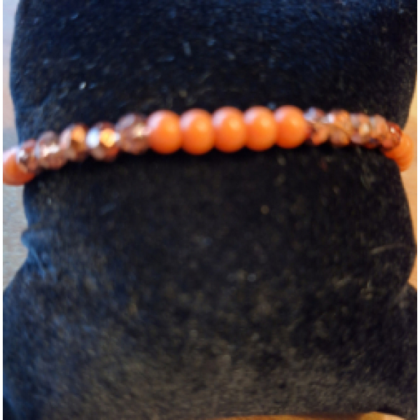 Kralenarmband met 4mm oranje kralen en bicones