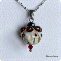 Dahliahanger bordeauxrood/crème van glas met ketting (lampwork)