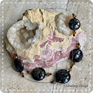 Lentil Zwart-Brons confetti zwevend (lampwork)