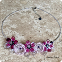 Roze bloemketting van glas (lampwork)