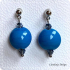 Blauwe lentil oorbel van glas (lampwork)