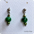 Groene oorbel van glas (lampwork)