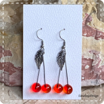 Kersoorbel (oranje) met blad (lampwork)