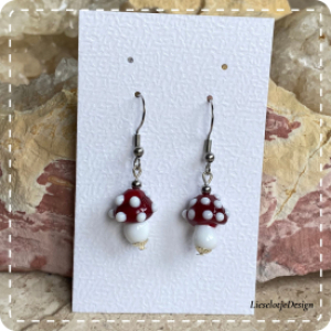 Paddenstoel oorbel van glas (lampwork)