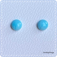 Licht blauwe oorknopjes van glas (lampwork)