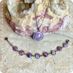 Cabochon sieradenset roze/paars (ketting+armband lampwork)